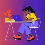 Small business owner frustrated by a website not showing up on Google while working on a laptop