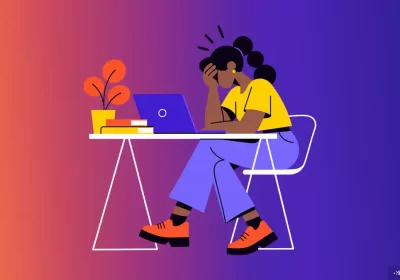 Small business owner frustrated by a website not showing up on Google while working on a laptop